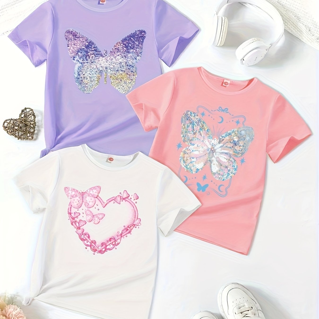 A Set of Three Stylish Short-Sleeve T-Shirts for Girls, Made from Comfortable Fiber, Perfect for Casual Summer Wear, Featuring Cute Cartoon Heart And Butterfly Prints, Suitable for Everyday And Outdoor Activities