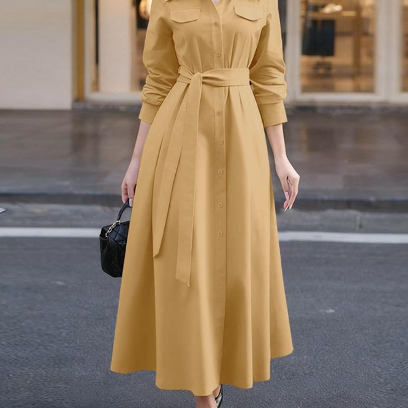 A Sophisticated Long-Sleeve Shirt Dress for Women Featuring a Lapel Collar, Single-Breasted Design, And a Tied Waist, Perfect for Casual Outdoor Commutes in an All-Matching Maxi Style