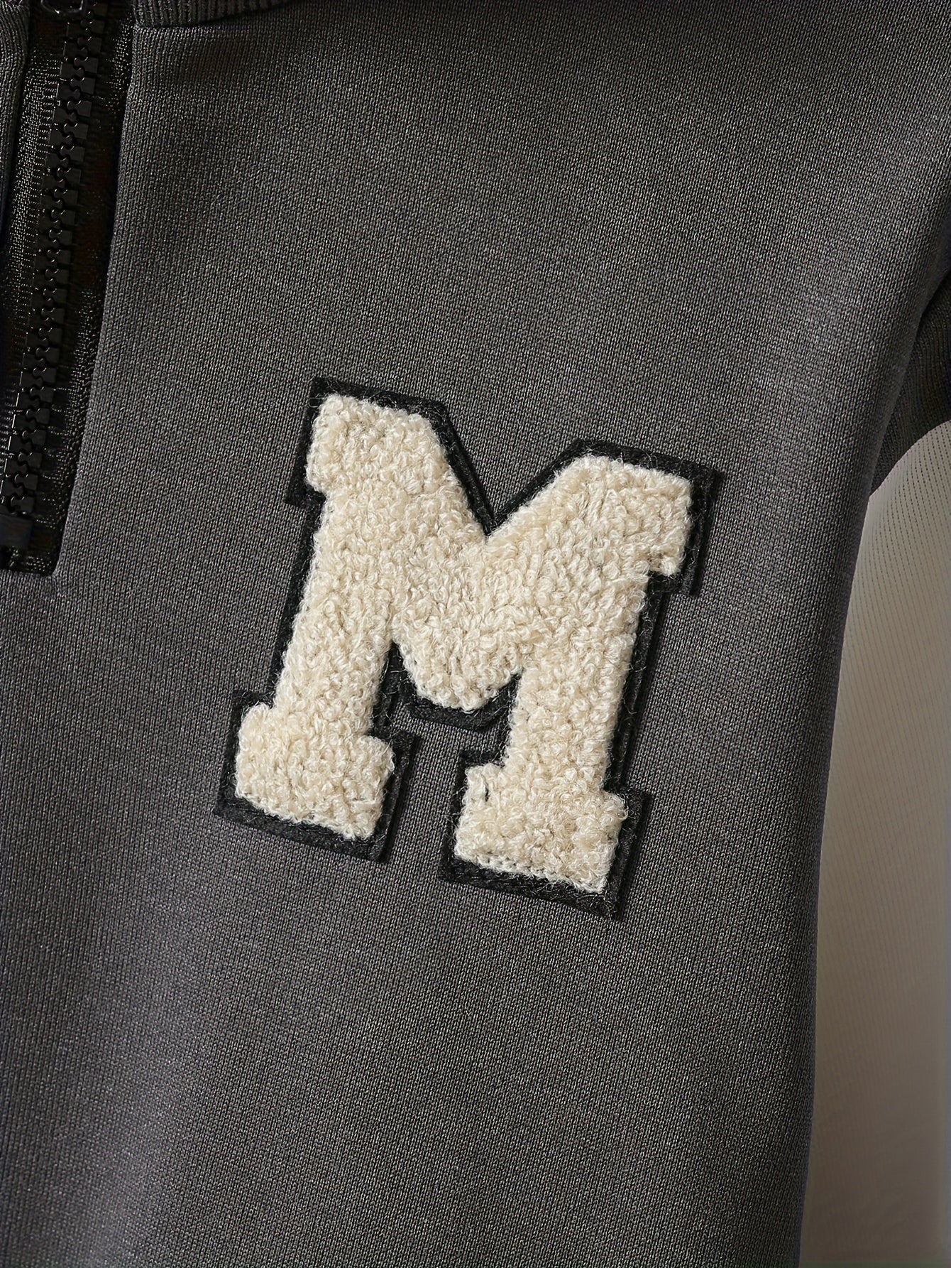 Boys' Autumn and Winter College Style Sports 2pcs Set! Dark Gray Hoodie with Contrast White Sleeves, High Neck Striped Ribbed Detail, Matching Solid Color Drawstring Pants. Fabric is Durable and Wrinkle-Resistant, Light Beige