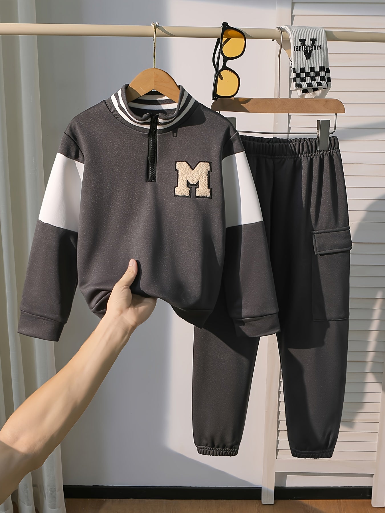 Boys' Autumn and Winter College Style Sports 2pcs Set! Dark Gray Hoodie with Contrast White Sleeves, High Neck Striped Ribbed Detail, Matching Solid Color Drawstring Pants. Fabric is Durable and Wrinkle-Resistant, Light Beige